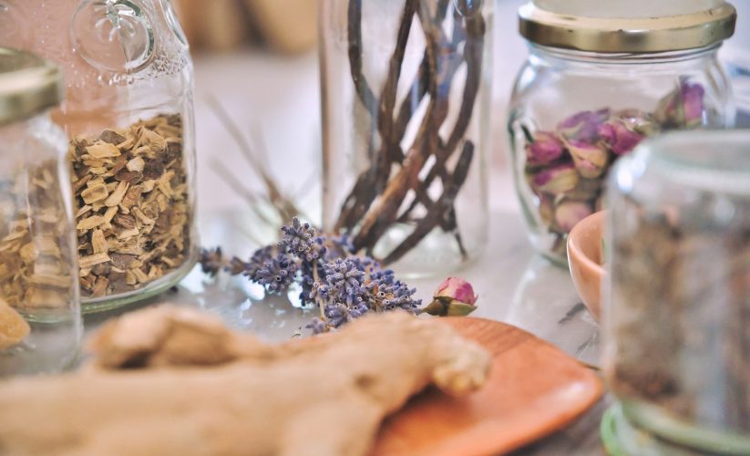 clear glass jar on brown wooden chopping board